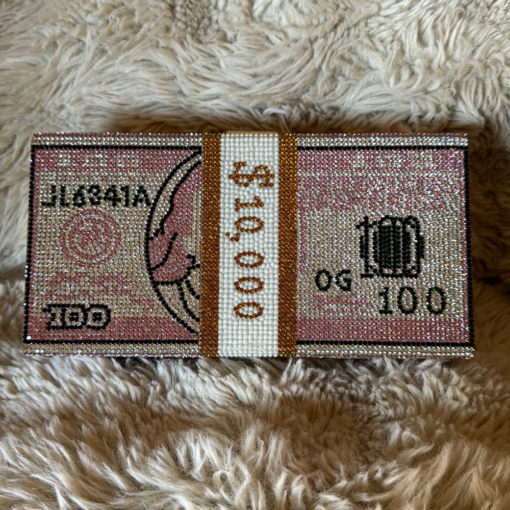 Pink blinged out $10,000 bill clutch with chain original owner